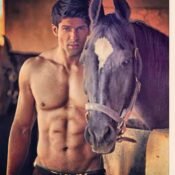 Haroon Kazi strikes a pose with a majestic horse, showcasing elegance and charisma